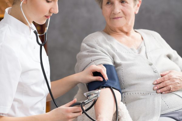 nurse-taking-elderly-woman-s-blood-pressure.jpg